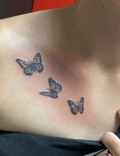 collar bone small butterfly tattoo on chest|Beautiful Butterfly Tattoo Ideas for Collar Bone